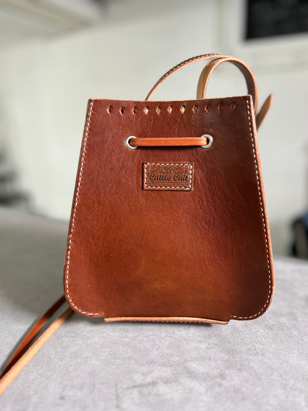 bolo leather backpack The Bolo Bag™